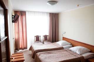Отель Отель Галичина Тернополь Стандартный двухместный номер с 2 отдельными кроватями-6